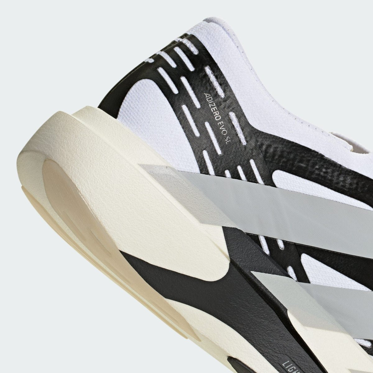 adidas originals AdizeroEVOSLLACELESSM フットウェアホワイト/グレーツー/コアブラック