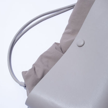 F/CE. TECH LEATHER MINI HAND POACH