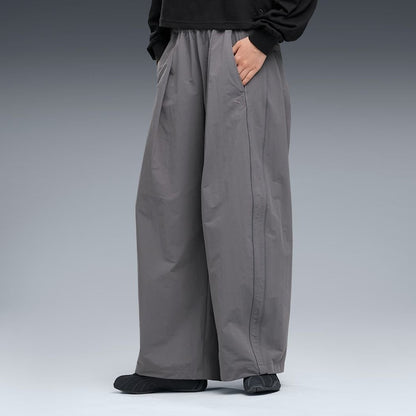 PUMA WASHER WOVEN LONG PANTS W（PROJECT PLUS） FLAT MEDIUM GRAY