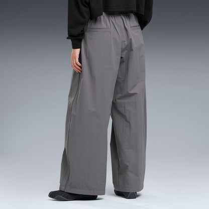 PUMA WASHER WOVEN LONG PANTS W（PROJECT PLUS） FLAT MEDIUM GRAY