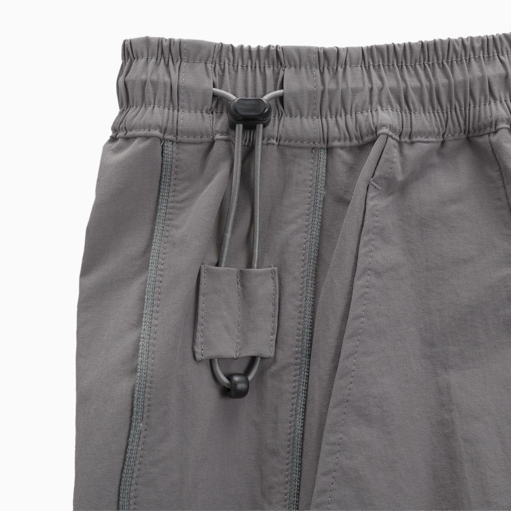 PUMA WASHER WOVEN LONG PANTS W（PROJECT PLUS） FLAT MEDIUM GRAY